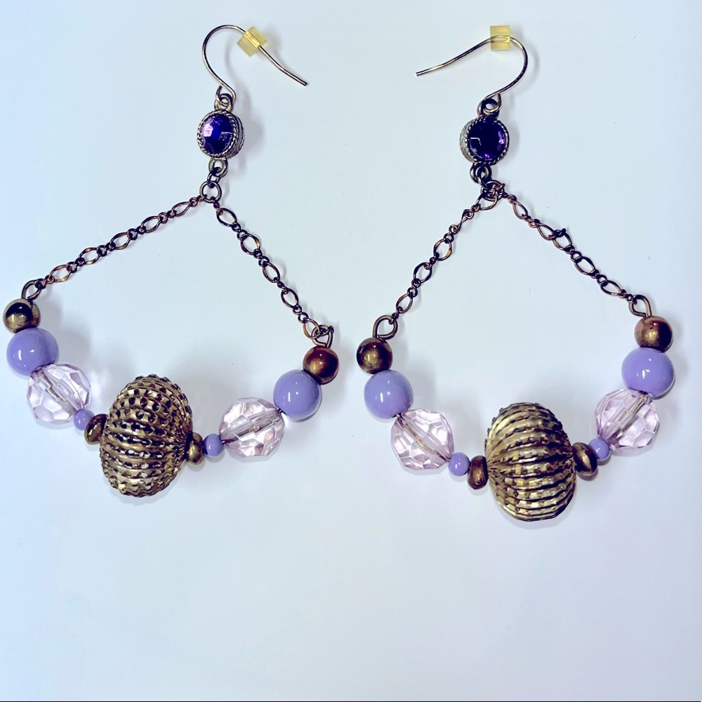 Bebe dangle earrings bronze plated and purple stones.